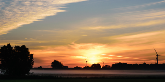 Sunset at Landscape with Windturbines